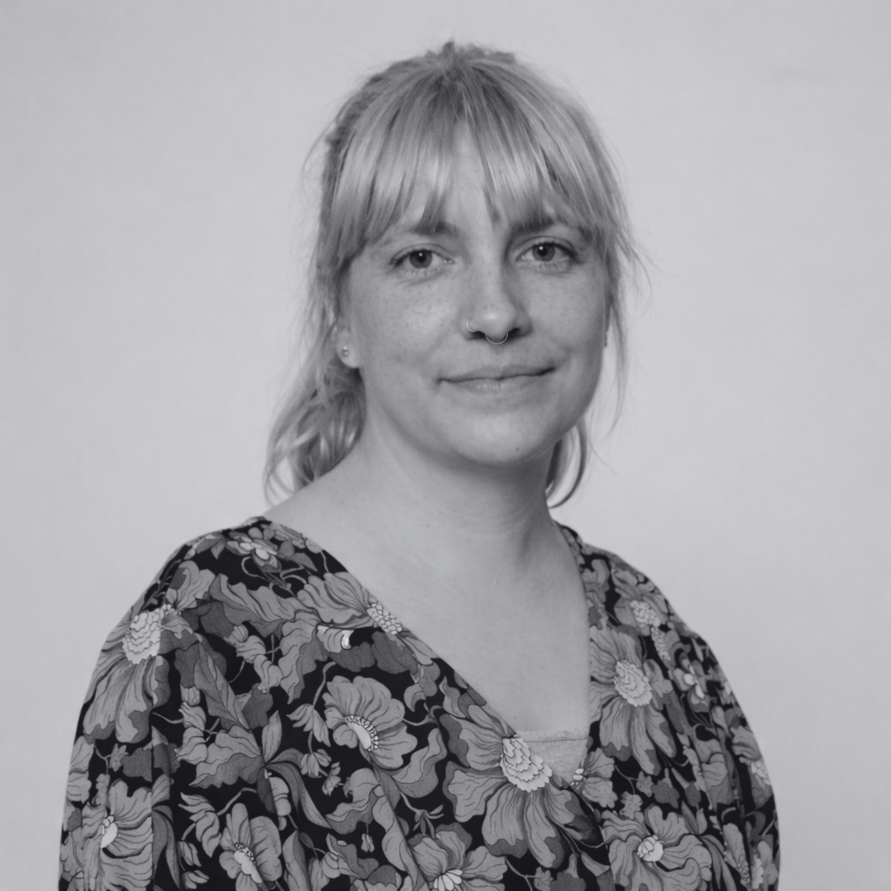 Black and white portrait photo of Alexandra Kroenert, founder of Soma Rights